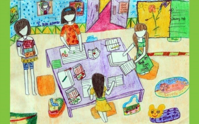 Học sinh đang ngồi đọc sách trên giấy vẽ, tạo nên hình ảnh thể hiện sự tập trung và ham muốn học hỏi của các em.