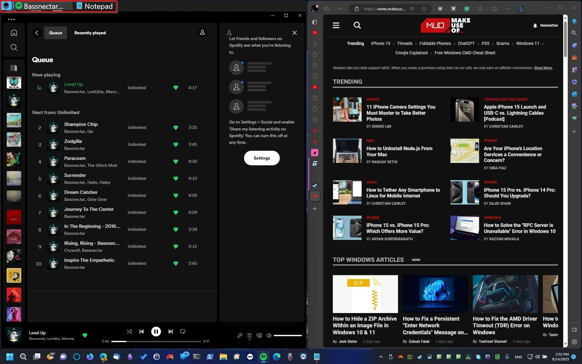 FancyWM bố cục theo chiều dọc với Spotify và Notepad chồng chất