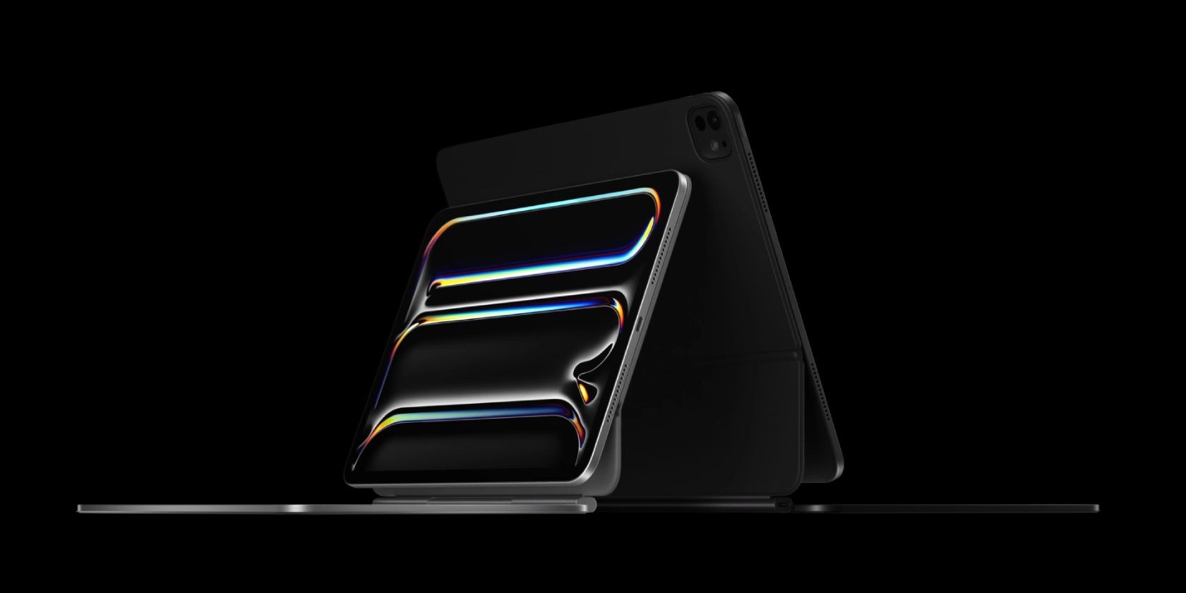 Hai iPad Pro bên cạnh nhau gắn với Magic Keyboard
