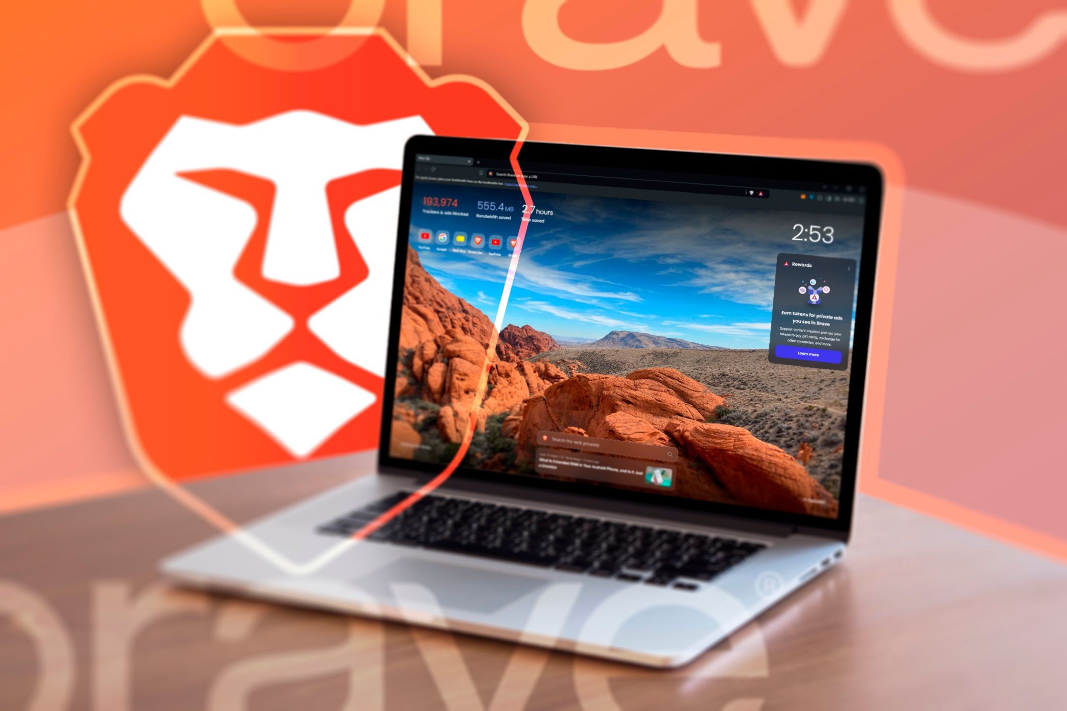 Một laptop với trình duyệt Brave mở và logo Brave ở phía sau