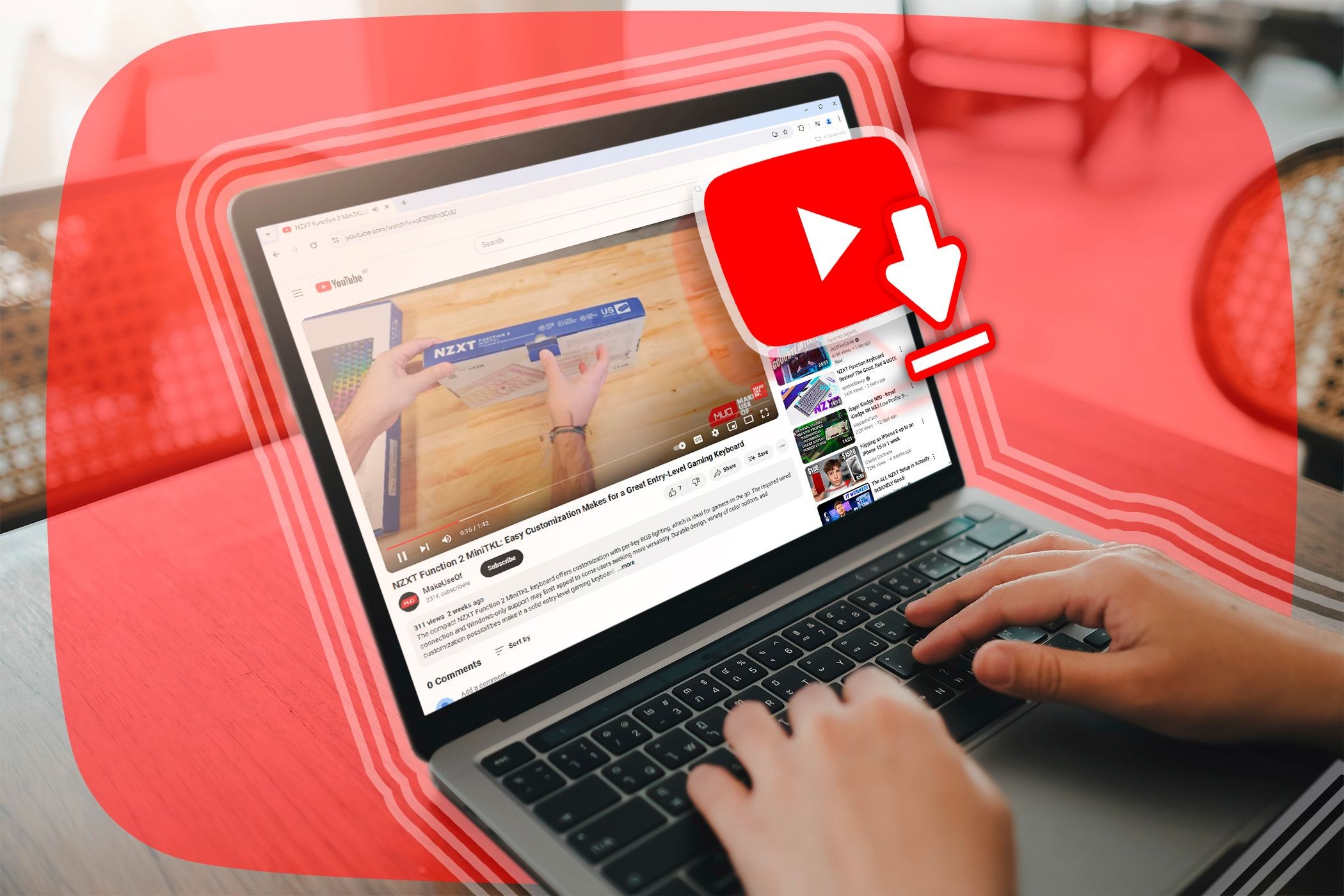 Một máy tính xách tay với YouTube mở trong Google Chrome và biểu tượng tải xuống trước màn hình