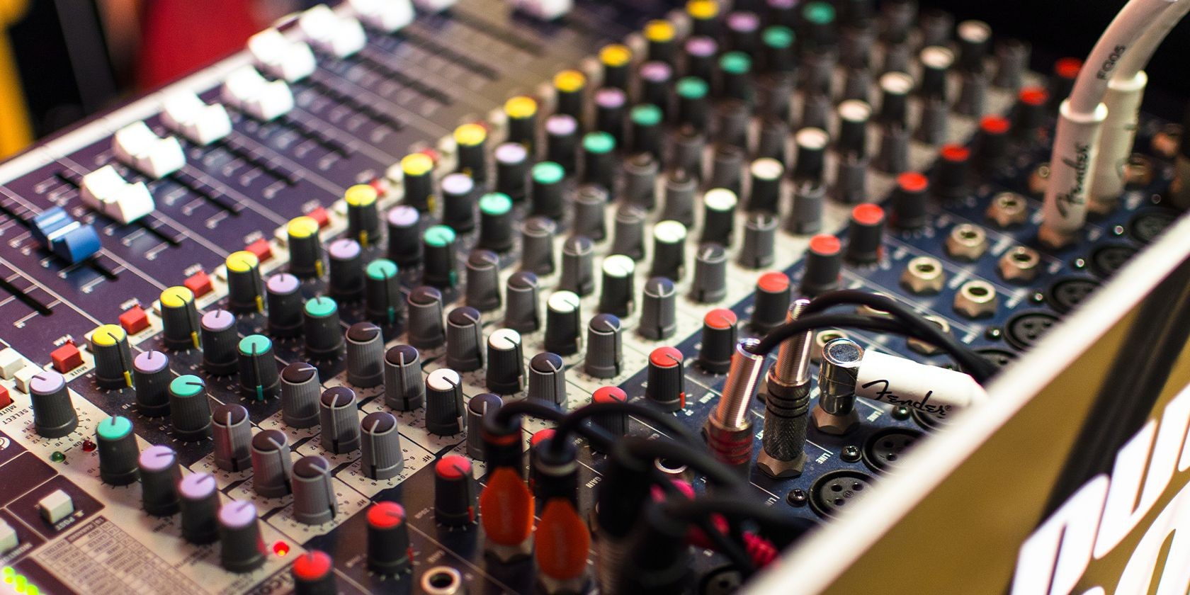 Photo of an XLR interface with many knobs and settings