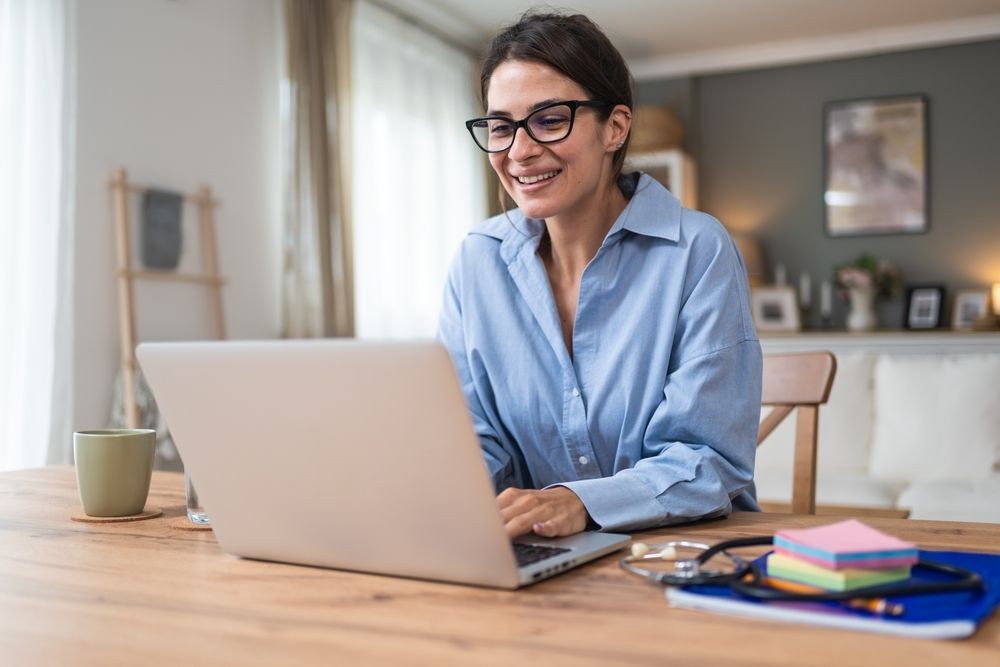 Young woman working at home office